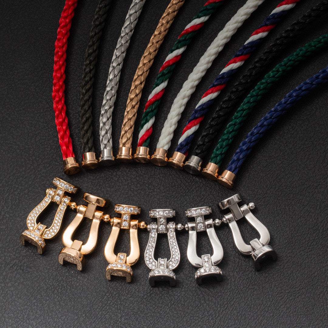 ˇGilded EraˇFORCE LARGE HORSESHOE HALF DIAMOND BRACELET GOLD